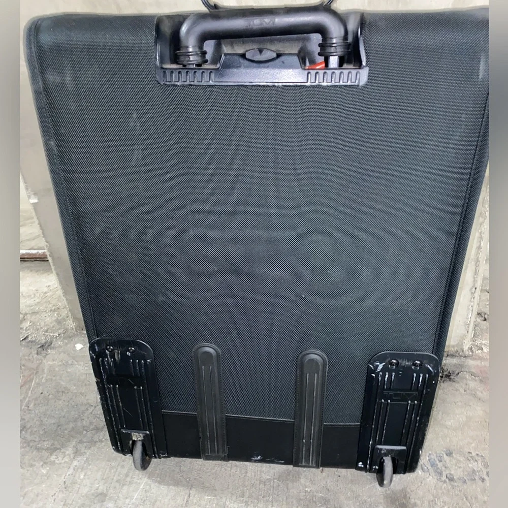 TUMI Check On Suitcase